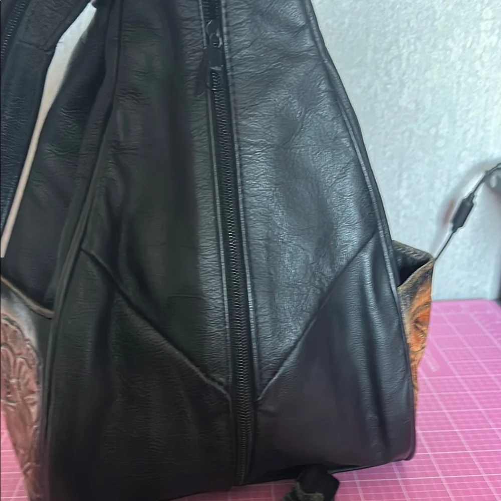 Stylish Black and Brown Backpack with Leather Accents